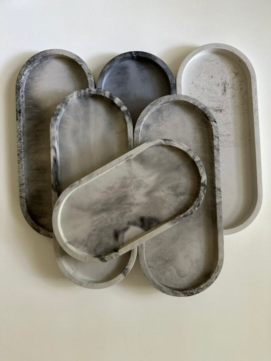 Handmade concrete tray in natural grey with marbled finish, modern minimalist design